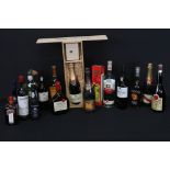 A collection of bottled spirits to include malt whisky, Rum, Liqueurs and wines.