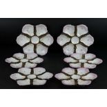 Set of 6 porcelain oyster plates, of hexagonal form with 6 wells hand-painted to depict pink and