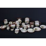 Approximately 30 items of Torquay Pottery Mottoware including Tea Pots, Coffee Pot, Preserve Jar,