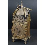 Brass Lantern Clock, with floral etched face and Roman numerals, the movement stamped R and Co,