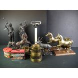 A box of mixed collectables to include a pair of brass horse ornaments, spelter figures, money