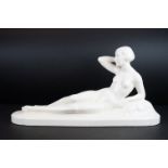 Sarreguemine French porcelain figure of a nude art deco lady posing whilst in a reclined position,