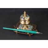 An antique Napolionic brass and enamel inkwell and pen holder.