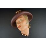 John Douglas Art Deco plaster face mask, 1920s / 1930s, modelled as a lady in sideways pose