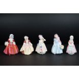 Five Royal Doulton porcelain figures of young ladies and girls, including Wendy, Tootles, Babie,