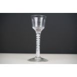 18th Century wine glass with spiral air twist stem, bucket form bowl and conical foot, approx 14.5cm