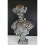 A terracotta bust of a lady of classical form in robed dress, with mock Verdigris finish, raised