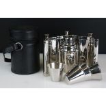 Leather cased stainless steel travelling cocktail set to include a cocktail shaker, three curved hip