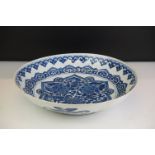 Chinese Porcelain Blue and White Shallow Bowl decorated with peonies, 36cm diameter (a/f)