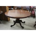 Victorian Mahogany Oval Tilt Top Breakfast Table on bulbous pedestal and four carved scrolling