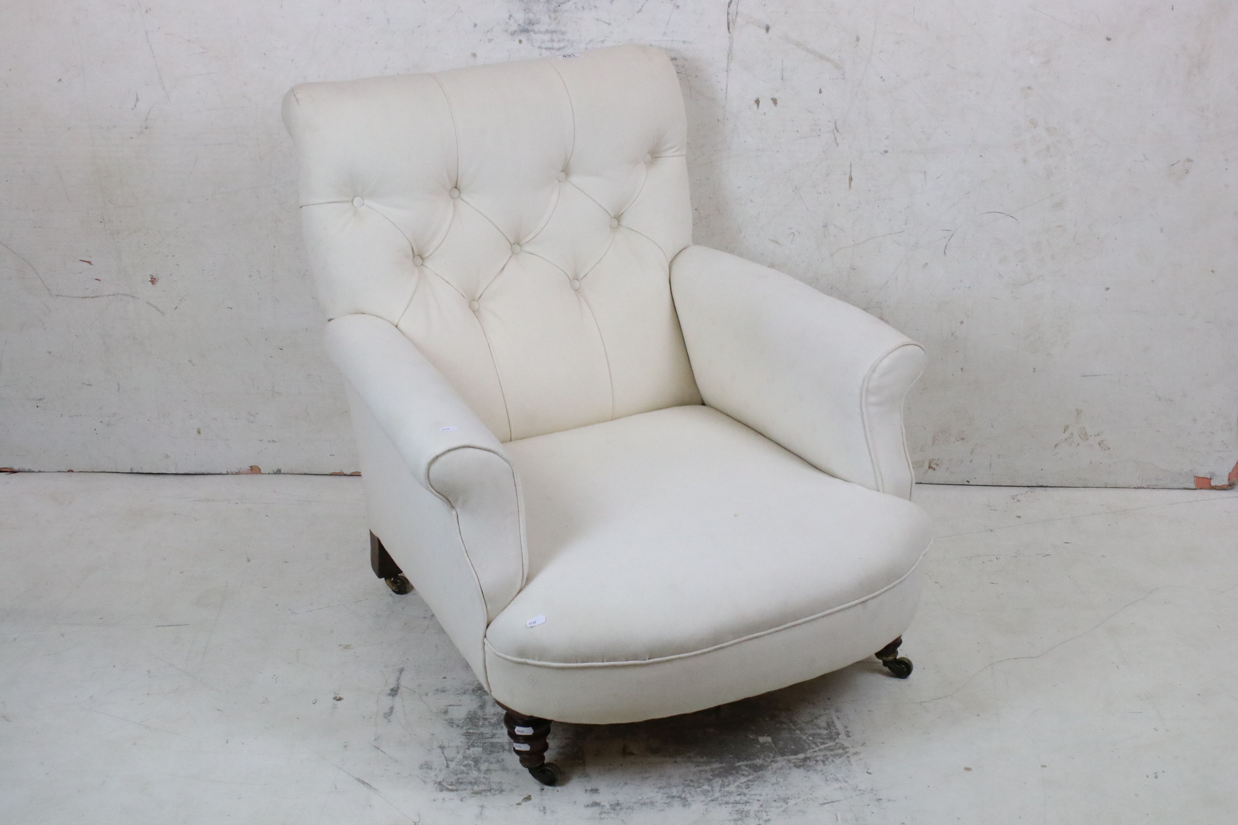 19th century Armchair, in the manner of Howard & Sons, with cream button back upholstery, raised