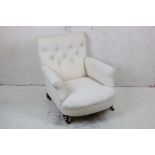 19th century Armchair, in the manner of Howard & Sons, with cream button back upholstery, raised