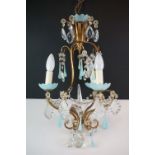 Early 20th century brass framed three-branch chandelier with blue glass & faceted crystal