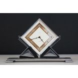 Smiths Art Deco 8 Days desk clock of lozenge form, with Arabic numerals, hinged on geometric