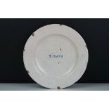 Continental cream glazed pottery dish, entitled ' TIBAES ' approx. 23cm diameter