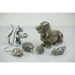 Collection of white metal animals, to include dog, owl, rat etc