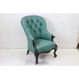 Victorian Green Button Back Upholstered Armchair with Mahogany Scrolling Carved Frame raised on
