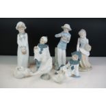 Eight Spanish porcelain figures to include Nao by Lladro (boy holding a puppy, girl with basket of