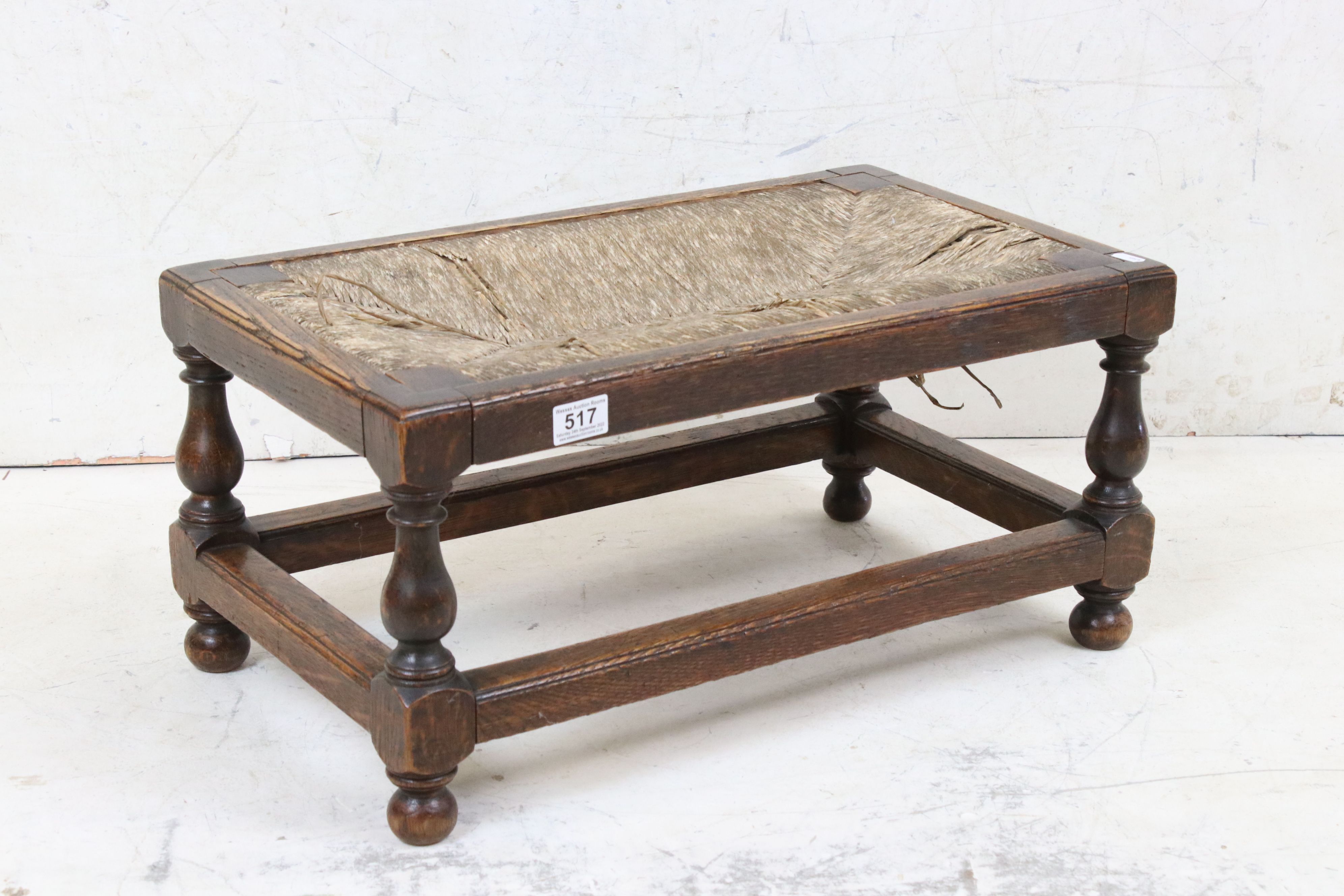 Early 20th century Oak Footstool in the 17th century manner with rush top, 60cm long x 29cm high