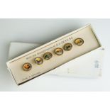 Boxed Buff Set of Six Guinness Waistcoat Advertising Buttons mounted on the original card