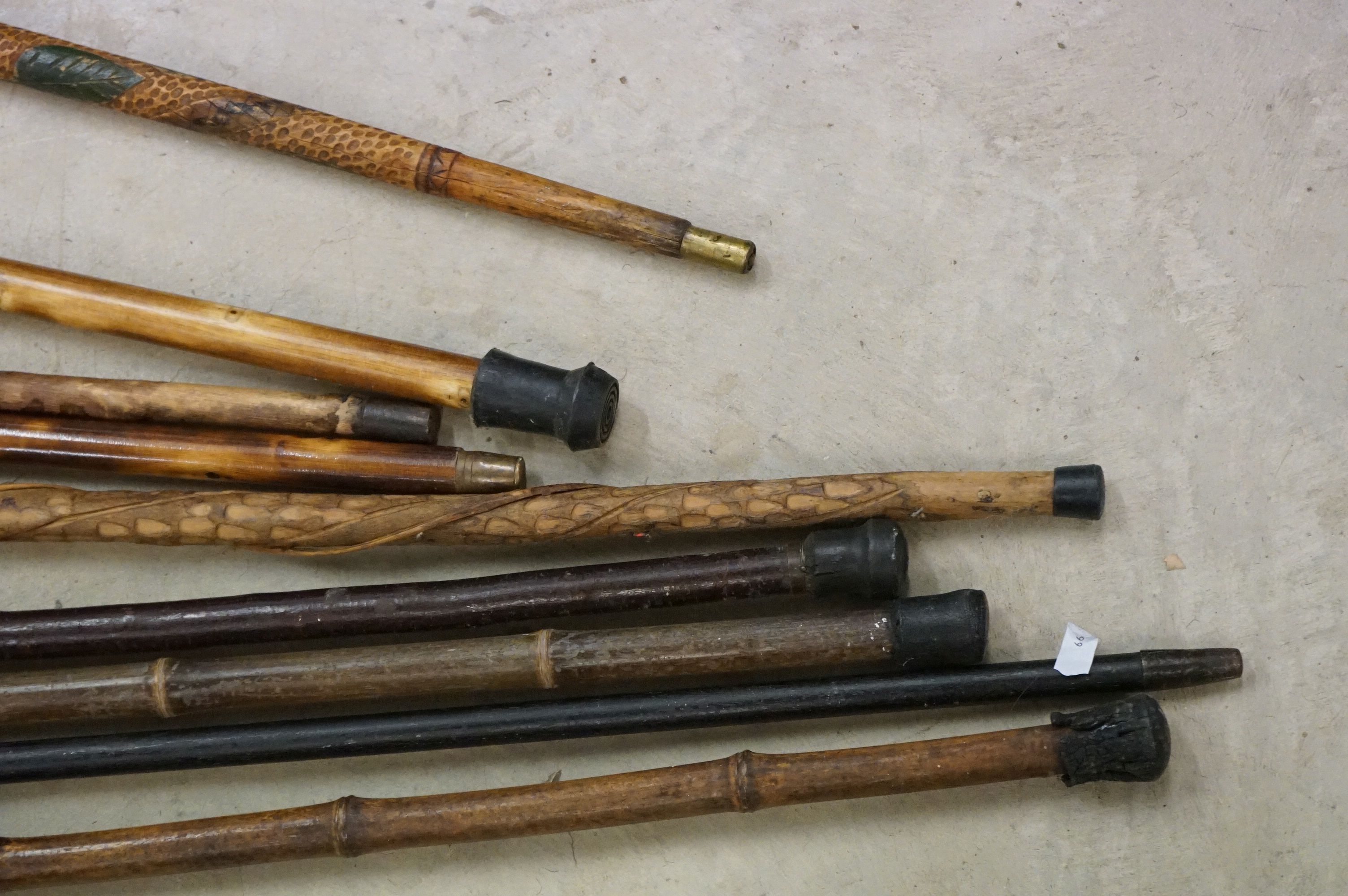 A collection of approx nine walking sticks to include a silver collard example. - Image 5 of 5