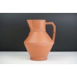Late 19th Century Watcombe Pottery terracotta jug of angular form with three serrated bands,