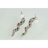 Pair of silver drop earrings set with sapphire, emerald and rubies
