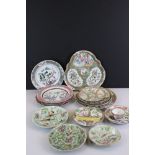 Fourteen items of Chinese Porcelain including Eight Cantonese Plates and a Cup decorated with