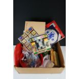 A box of mixed collectables to include coins, tokens, advertising tins, crystals...etc..