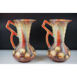 Pair of Art Deco Falcon Ware ' Melville ' pattern ewers with polychrome abstract decoration,