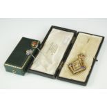 A silver gilt masonic queen Victoria jubilee medal together with two silver tie pins.