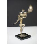 Art Deco Lady & Globe Metal Table Lighter, raised on a square base, approx 18cm high