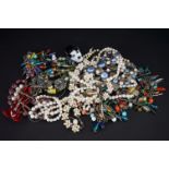 A collection of vintage and contemporary costume jewellery to include beaded necklaces and a Lea