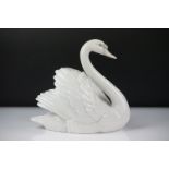 Lladro porcelain figure of a swan swimming, model no. 5231, approx 18.5cm high