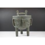 Vintage James Mont style circular lidded ice bucket of Chinese design raised on three legs with