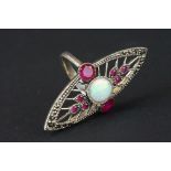 Silver dress ring with central opal panel and rubellite stones