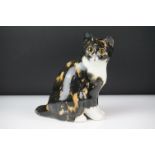 Winstanley pottery figure of a seated tabby cat with glass eyes, size 2, signed Winstanley to