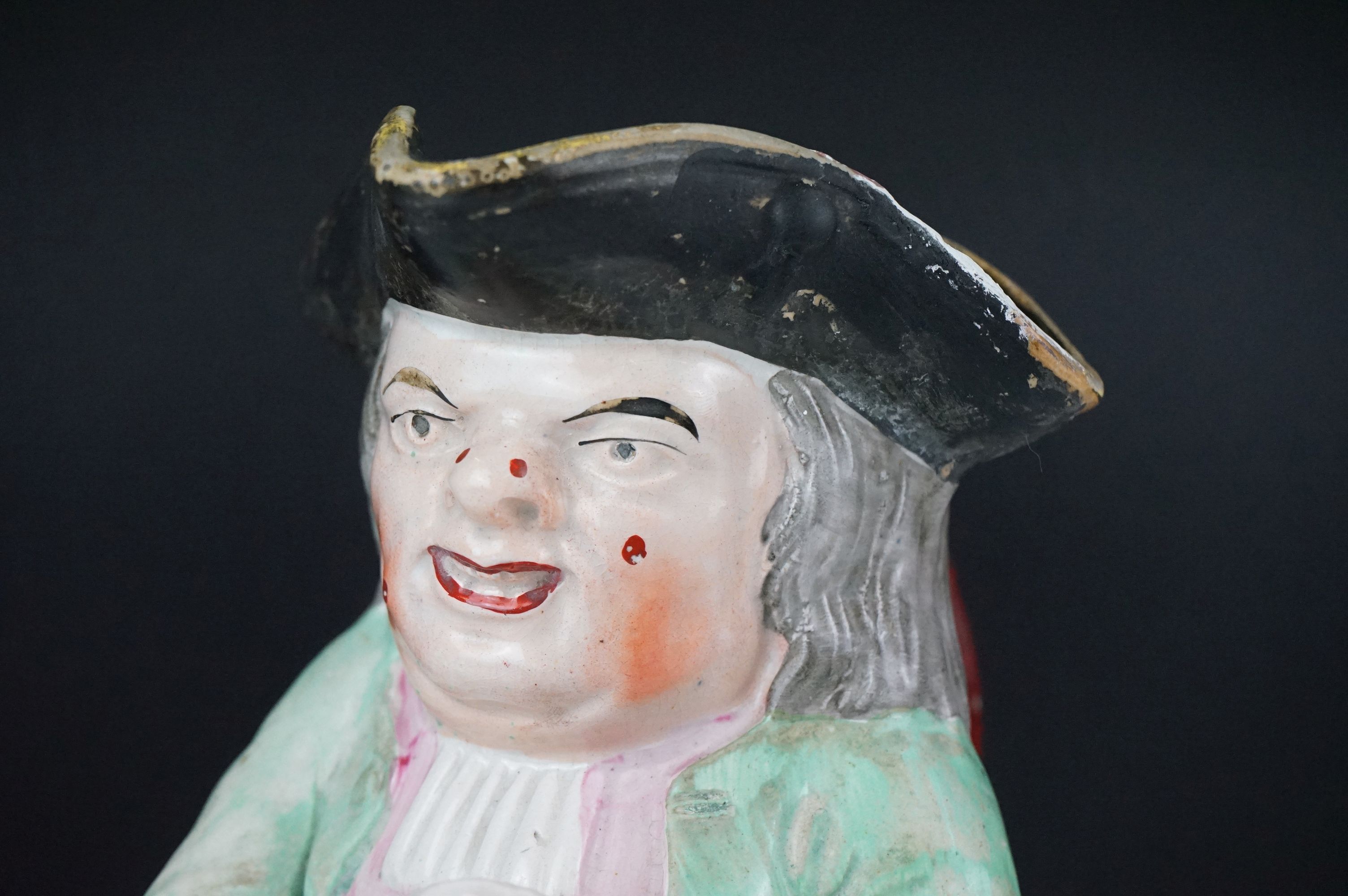 19th Century Staffordshire Toby jug modelled as Toby Philpott holding a foaming tankard and pipe, - Image 7 of 14