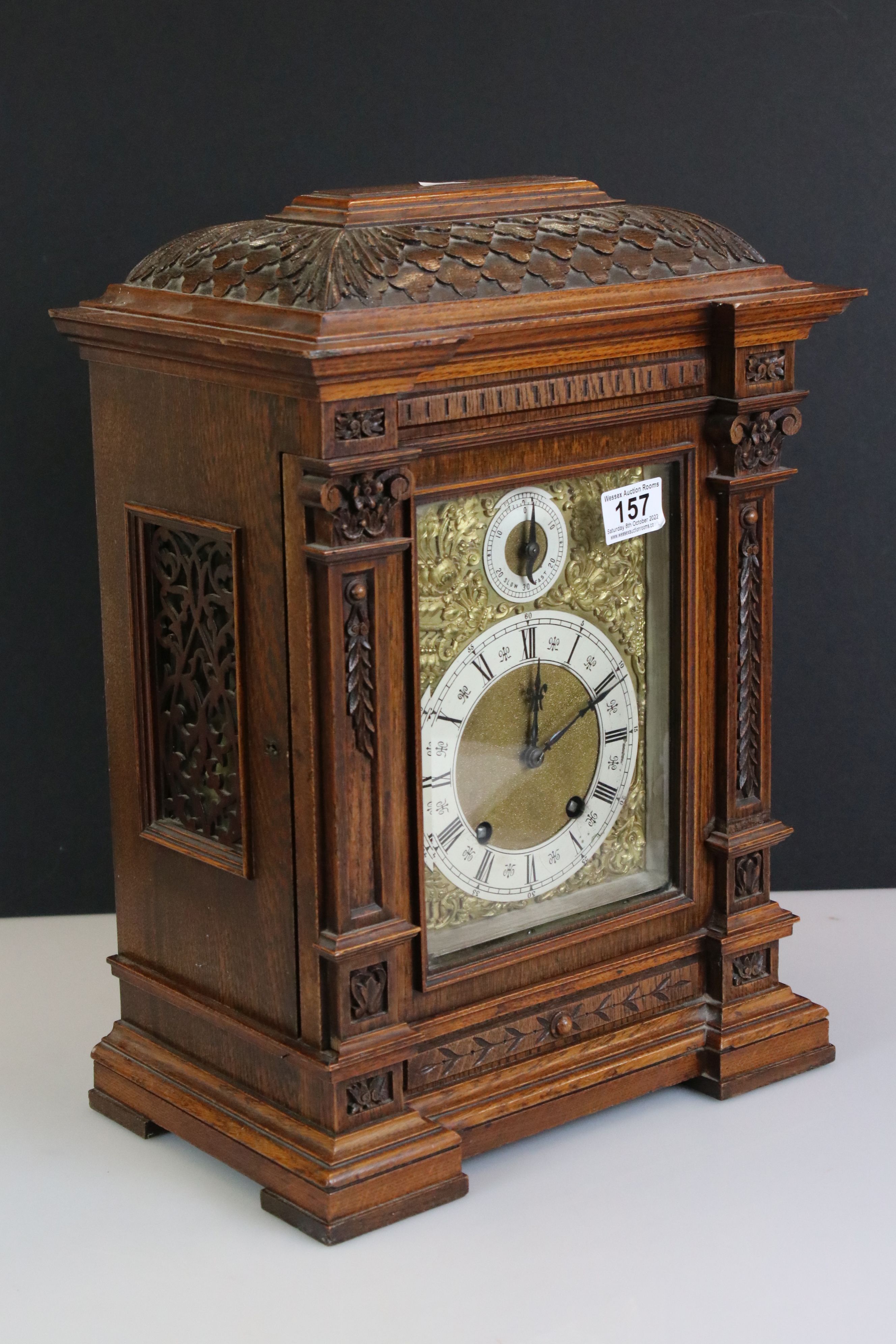 Late 19th / Early 20th Century Lenzkirch carved oak bracket clock, the brass dial with silvered