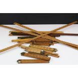 Approximately Twenty Five Early to Mid century Wooden Rulers, some folding including Rabone, Helix