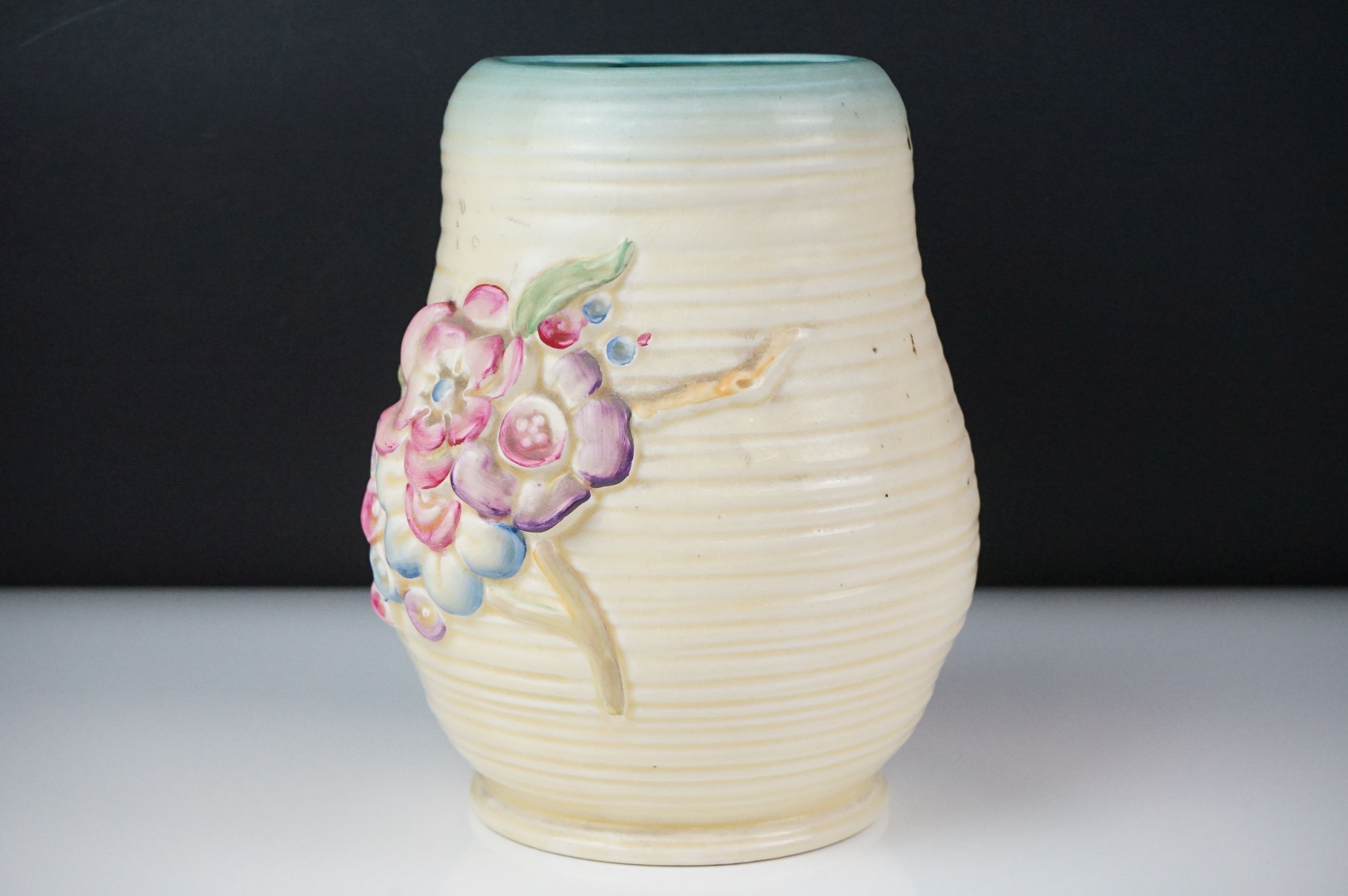 Clarice Cliff Newport Pottery vase of baluster form, with polychrome moulded blossom decoration on a - Image 3 of 7