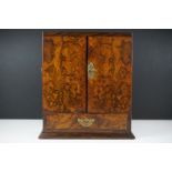 19th Century burr walnut table top smokers cabinet, with two doors opening to reveal three drawers