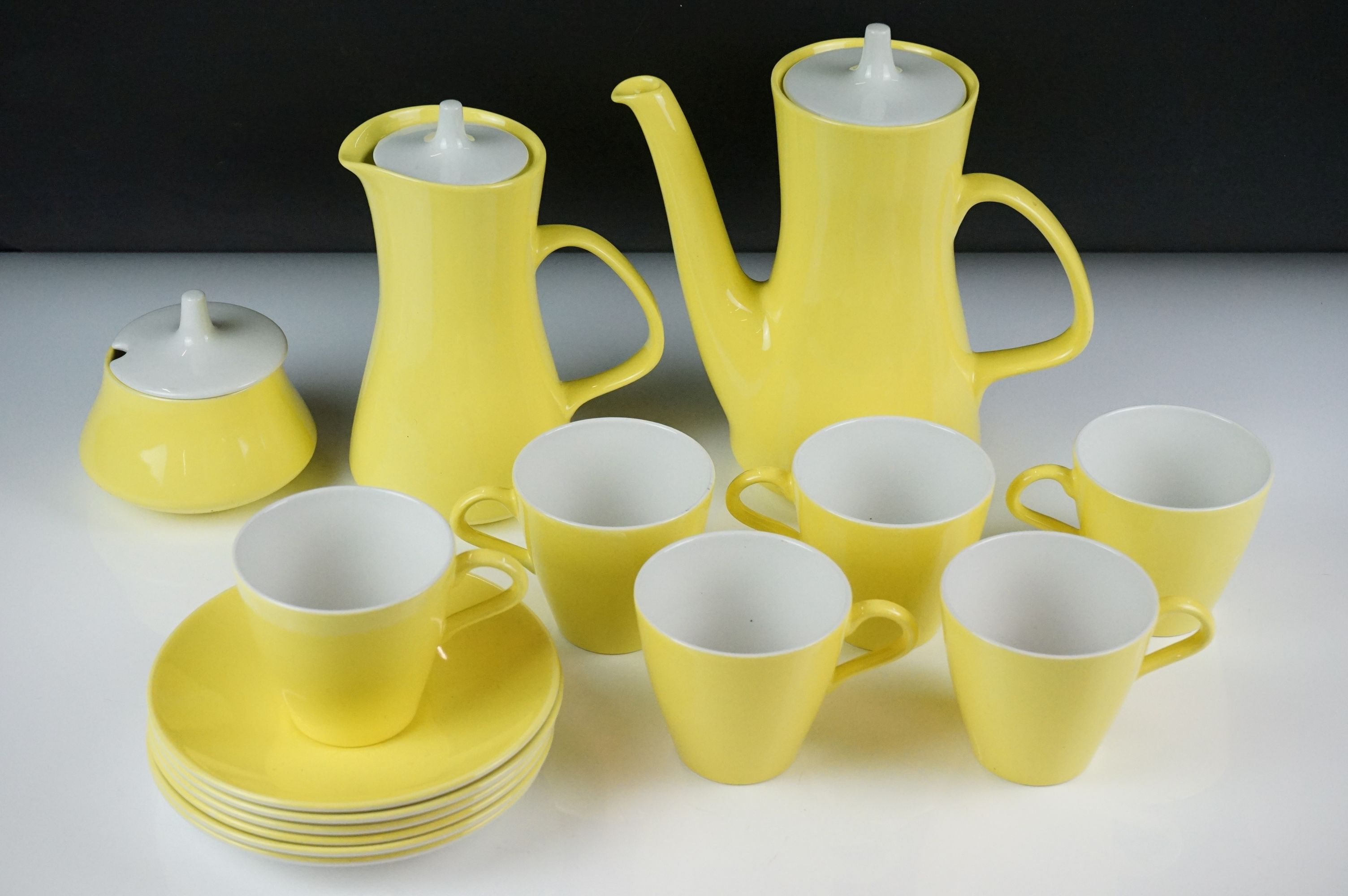 Poole Pottery bright yellow coffee service to include a coffee pot & cover, hot water jug, 6 tall