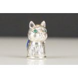 Silver cat pincushion with emerald eyes