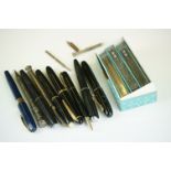 A collection of fountain pens and pencils to include Parker, Waterman and Sheaffer examples, some