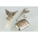 A fully hallmarked sterling silver vesta case together with a sterling silver baby rattle in the