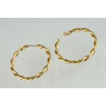 A pair of fully hallmarked ladies 9ct gold creole hoop earrings.