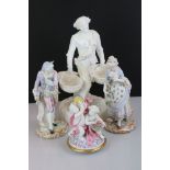 Pair of Chelsea style porcelain figures in 18th century dress with floral and gilt decoration, to