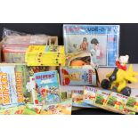 A large group of Rupert the Bear collectables to include books, toys, games and costume.