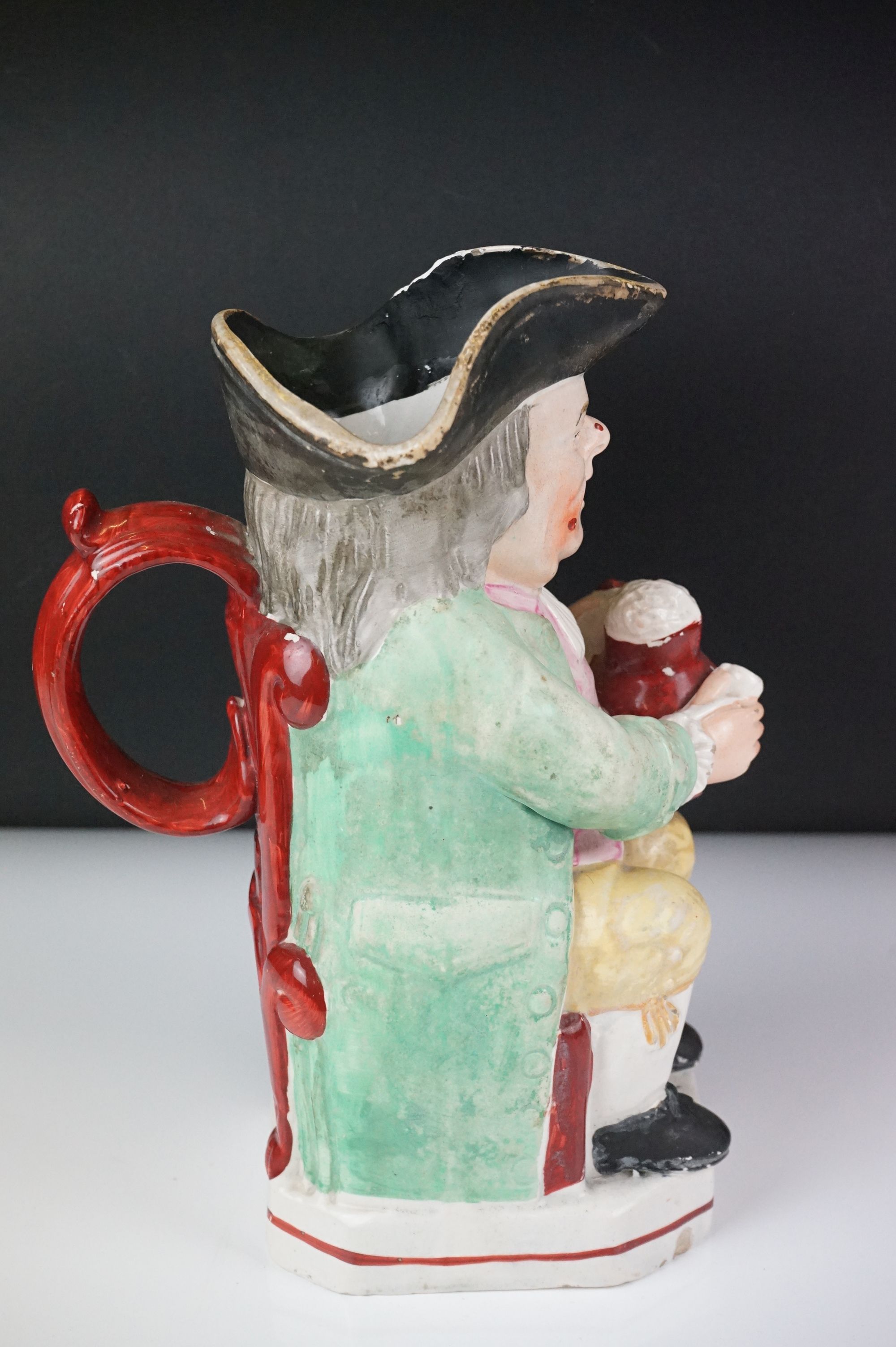 19th Century Staffordshire Toby jug modelled as Toby Philpott holding a foaming tankard and pipe, - Image 3 of 14